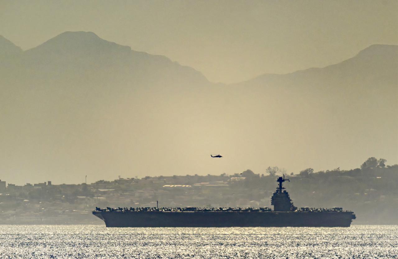 US aircraft carrier USS Gerald Ford is heading through the Strait of Gibraltar on February 20, 2026. (Photo by David Parody/DM Parody/AFP)