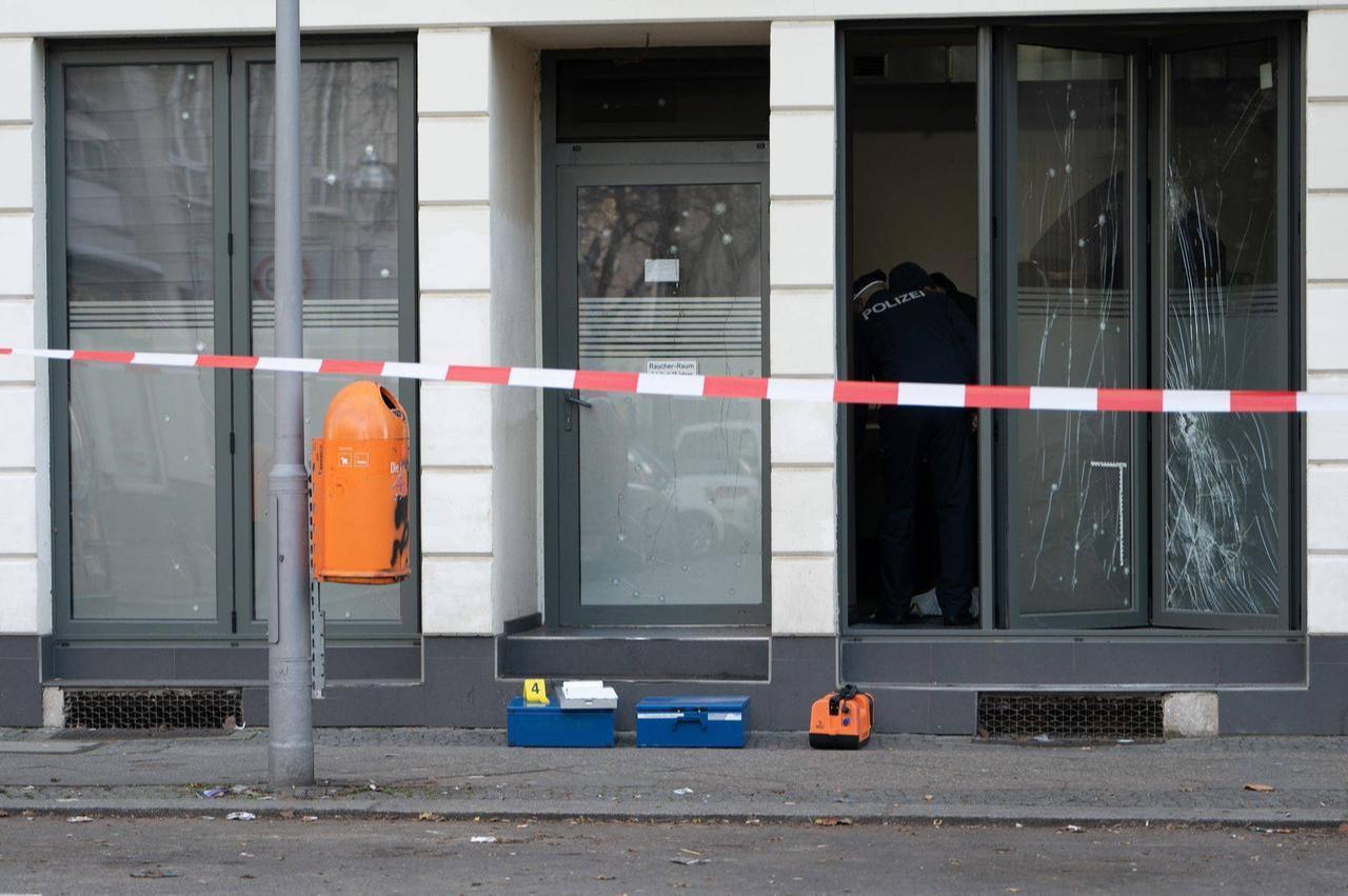 German police officers inspect the scene after a hand grenade exploded in a nightclub in Germany's Berlin-Kreuzberg in December 2025. (Photo via ga.de/DPA)