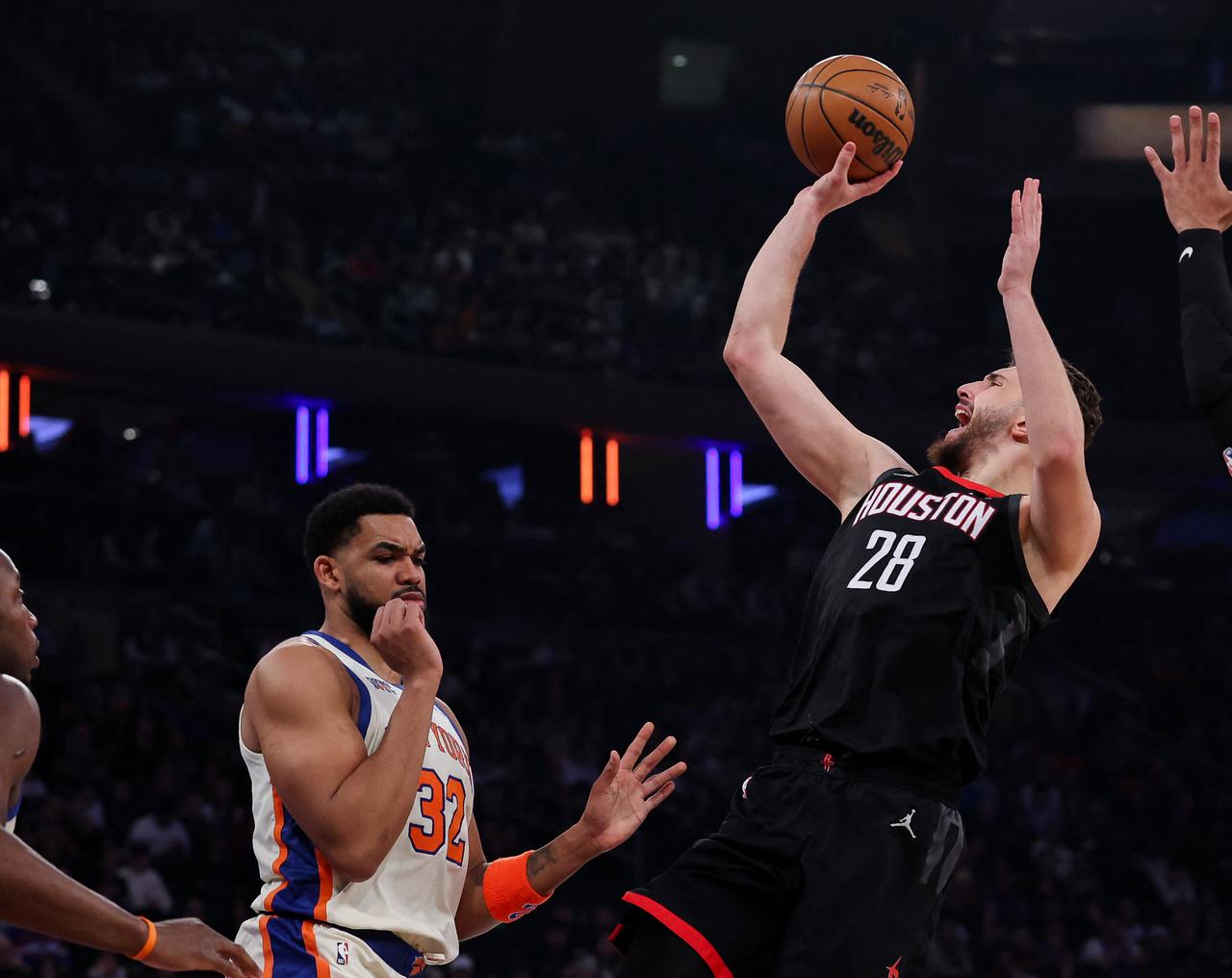 Alperen Sengun #28 of the Houston Rockets shoots the ball over New York Knicks player during the first quarter at Madison Square Garden on Feb. 21, 2026 in New York City. (Photo by Ishika Samant/Getty Images North America/Getty Images via AFP)