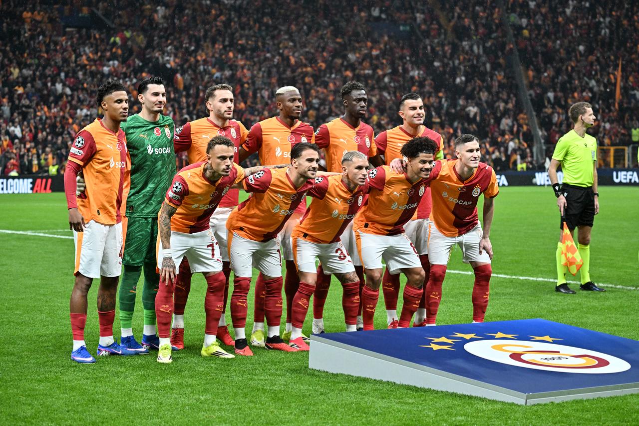 Galatasaray players pose for a team photo before the UEFA Champions League Round of 16 play-off first leg match between Galatasaray and Juventus at RAMS Park in Istanbul, Türkiye, Feb. 17, 2026. (AA Photo)