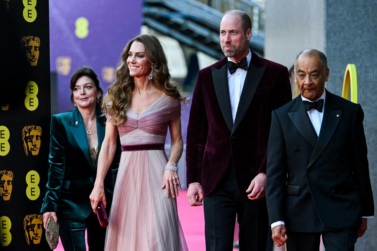Britain's Catherine, Princess of Wales and Britain's Prince William, Prince of Wales, together with arrive with Jane Millichip, CEO of the British Academy of Film and Television Arts and Lord-Lieutenant of Greater London Ken Olisa arrive  at the BAFTA British Academy Film Awards at the Royal Festival Hall, Southbank Centre, in London, UK, Feb. 22, 2026. (AFP Photo)