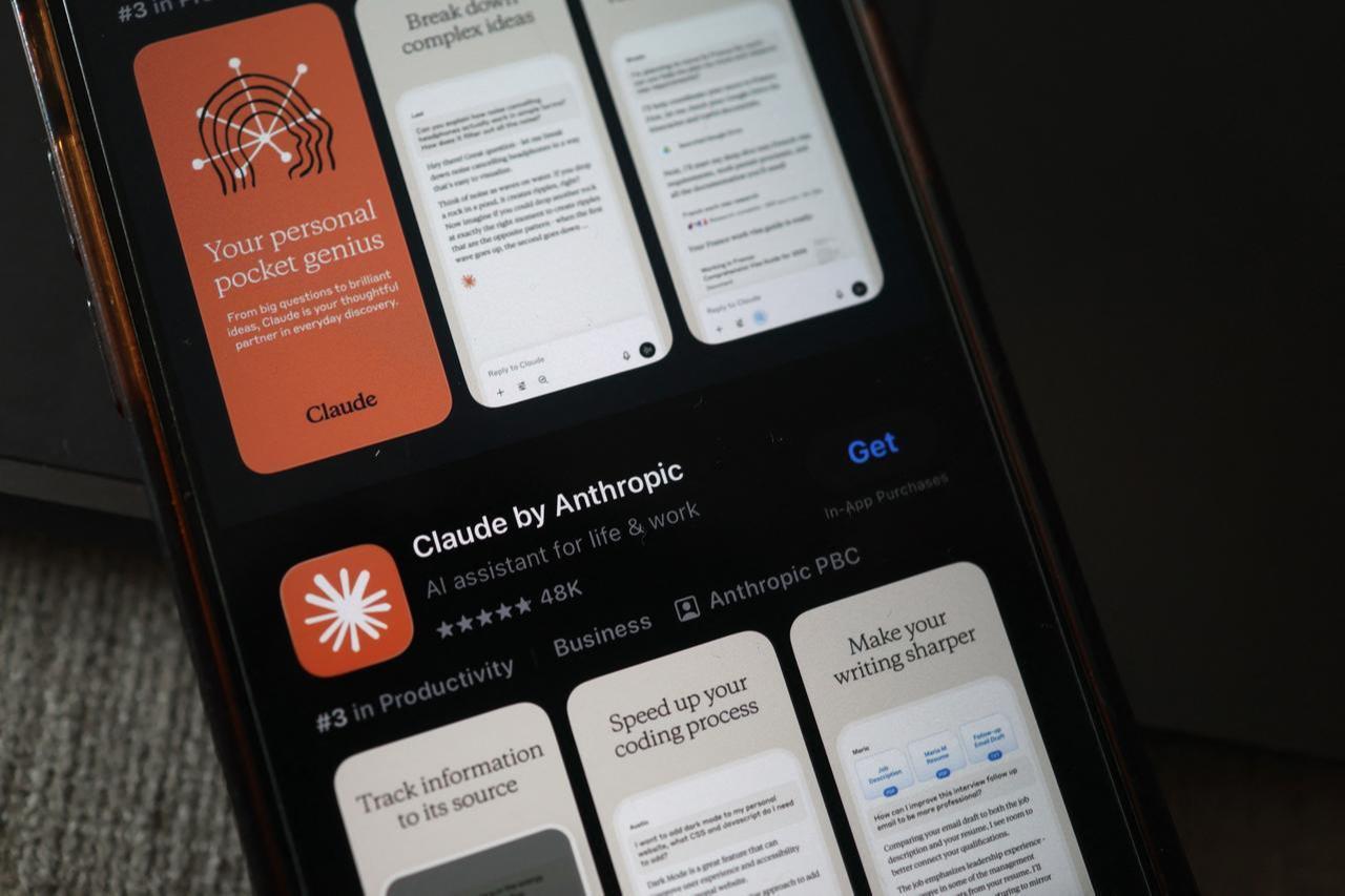 In this illustration, the Claude AI app is seen in the app store on a phone on February 16, 2026 in New York City. (AFP Photo)
