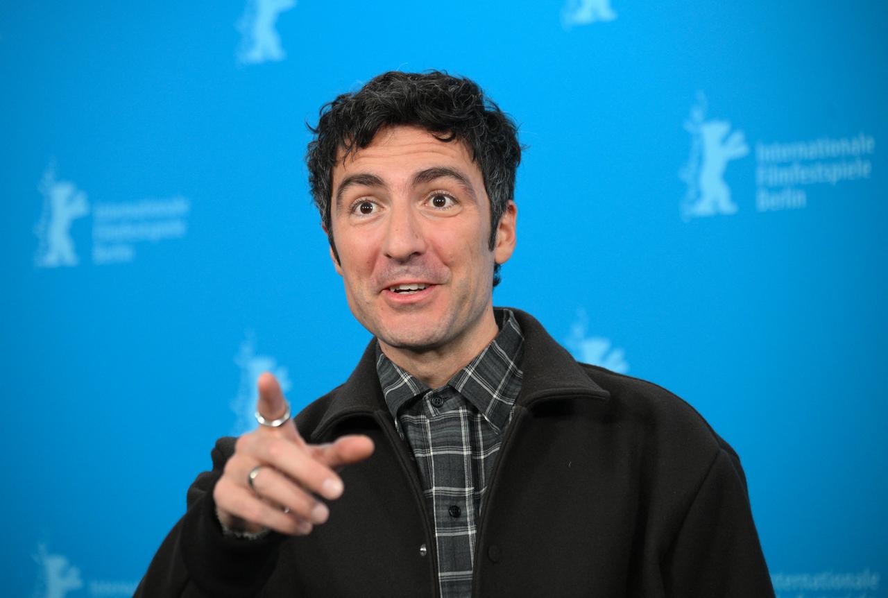 Director Ilker Catak poses during a photo call for the film "Sari Zarflar" (Yellow Letters) presented in competition at the 76th Berlinale, Europe's first major film festival of the year, Berlin, Germany, February 13, 2026. (AFP Photo)
