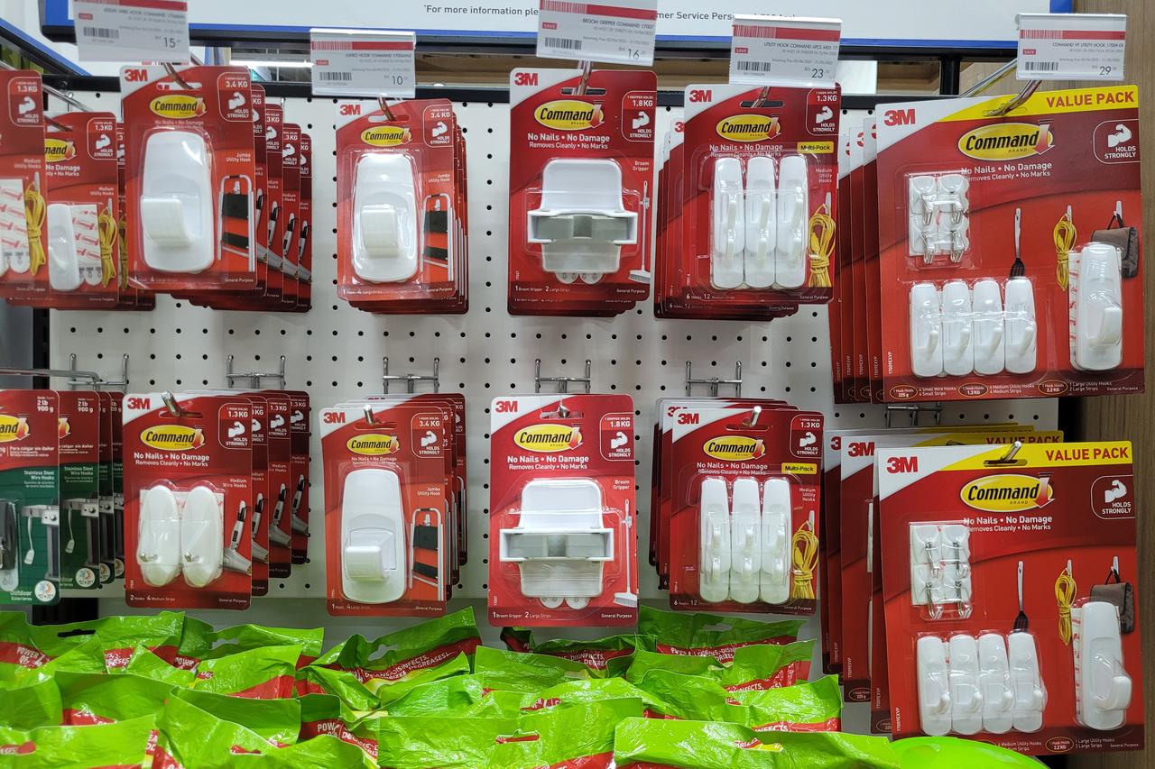 Row of Command brand Picture Hanging Strips and Hooks display on store shelf, accessed on Feb. 24, 2026. (Adobe Stock Photo)