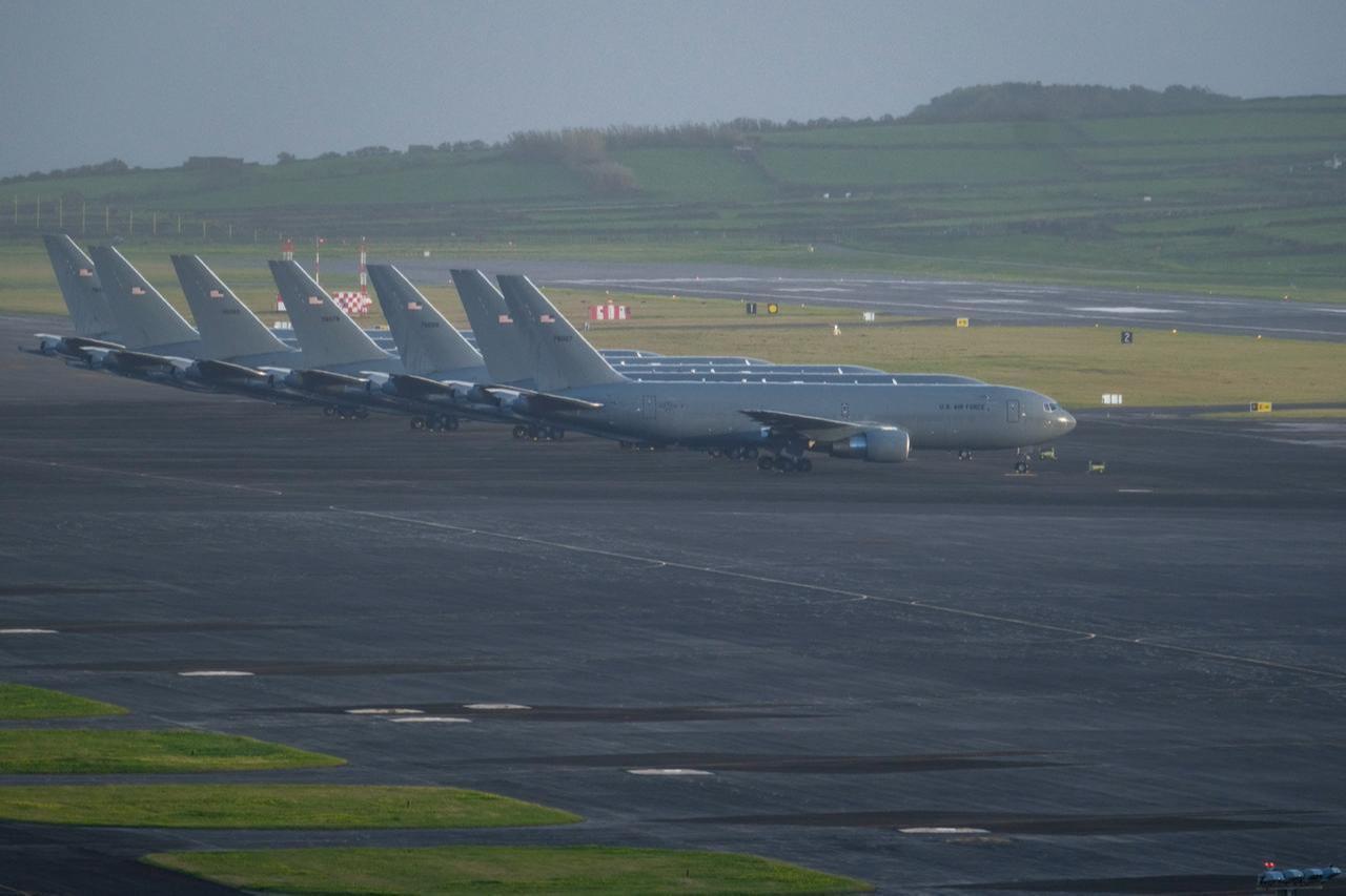 A row of some of the fifteen US Air Force KC-46 Pegasus tankers and one P-8 Poseidon tanker from the US Navy are seen stationed at Lajes Air Base, Praia da Vitória, Terceira Island, in the Azores archipelago in the Atlantic Ocean, Feb. 23, 2026. (AFP Photo)