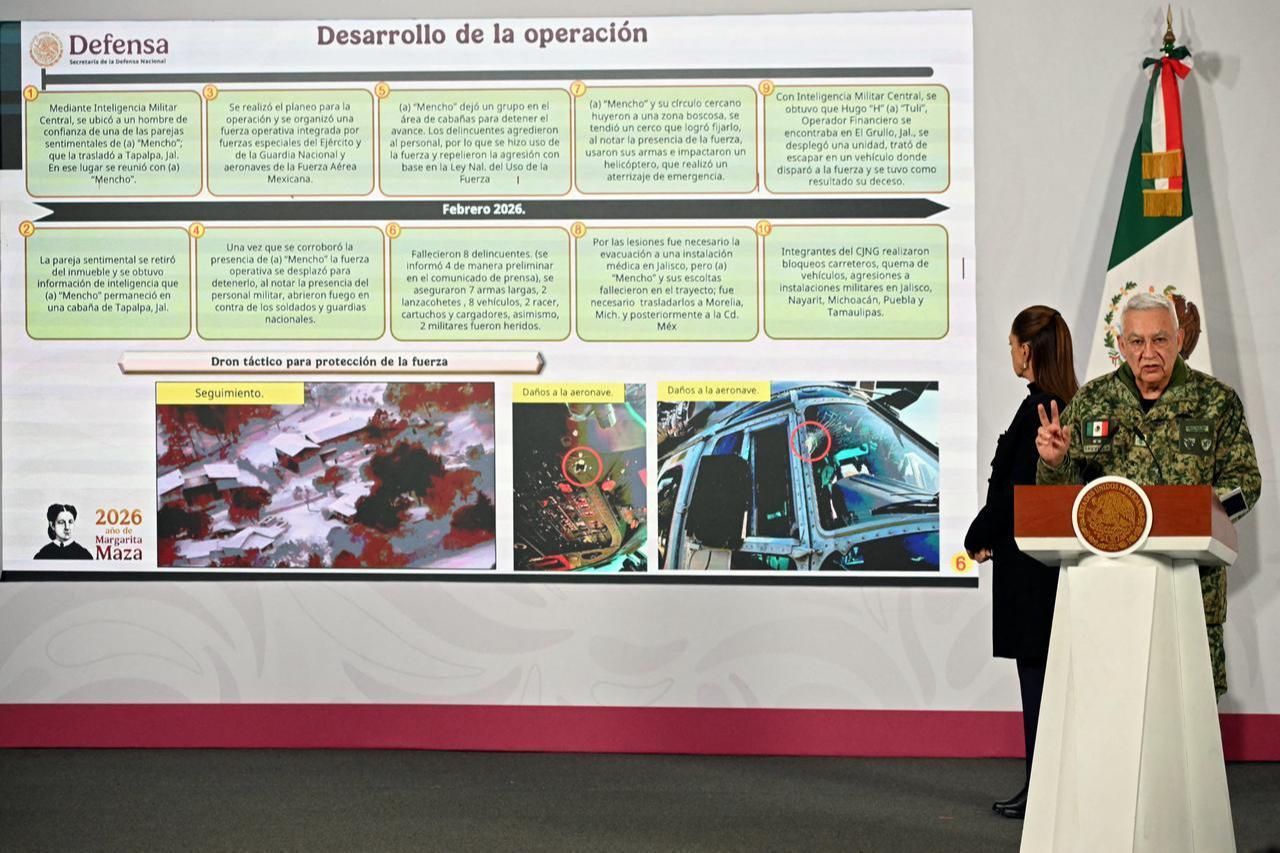 Mexico's Minister of Defense Ricardo Trevilla Trejo speaks next to President Claudia Sheinbaum during her daily press conference at Palacio Nacional in Mexico City, Feb. 23, 2026. (AFP Photo)