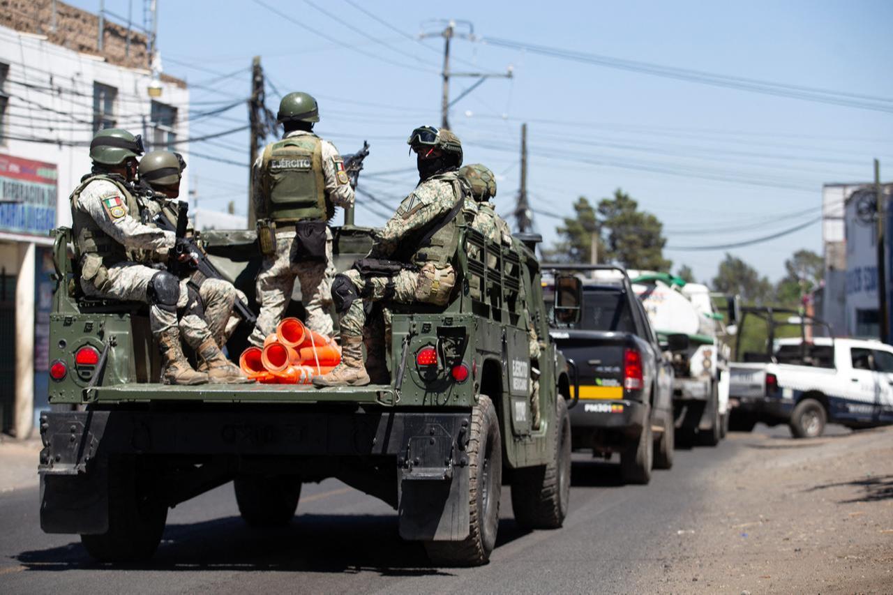 Members of the Mexican Army patrol the Morelia–Patzcuaro Highway to prevent vehicle fires and road blockades in Michoacan state, Mexico, Feb. 23, 2026. (AFP Photo)