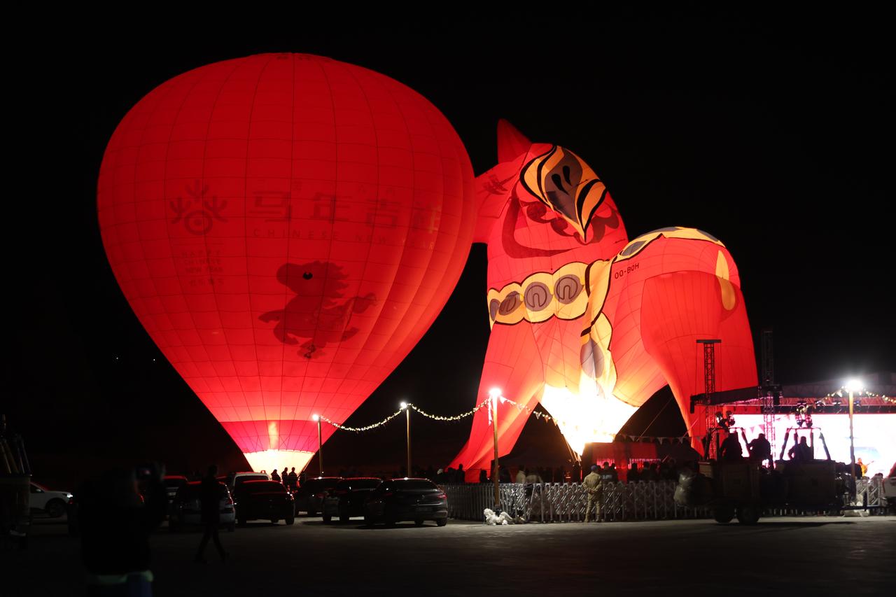 Illuminated hot air balloons and a horse-shaped installation light up the night sky during Chinese Year of the Horse celebrations in Cappadocia, Türkiye, Februay 2026. (AA Photo)