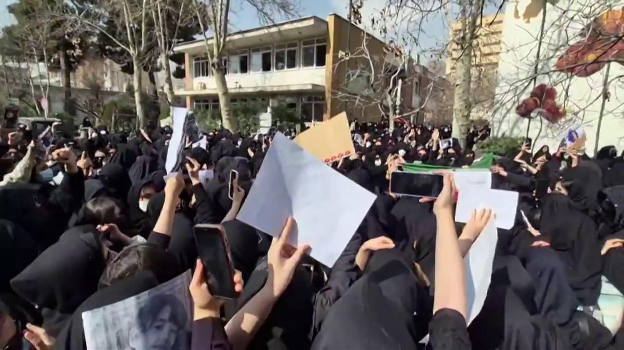 This video grab taken from UGC images posted on social media on February 23, 2026, and verified by AFPTV teams in Paris, shows students gathering for an anti-government rally at the all-female Alzahra university in Tehran. (AFP Photo)