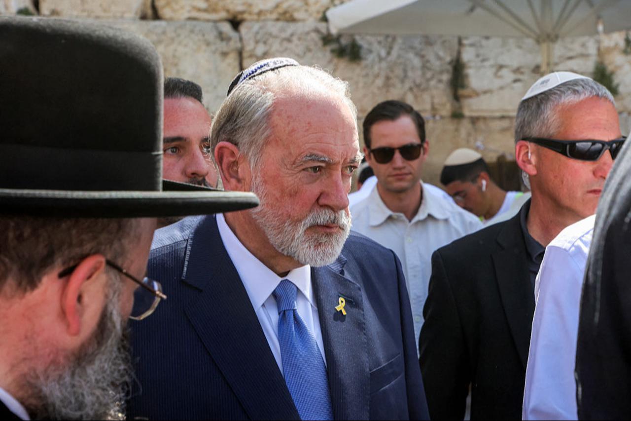 The US' new ambassador to Israel Mike Huckabee (C) visits the Western Wall, the holiest site where Jews are allowed to pray, in the old city of Jerusalem, Israel on April 18, 2025. (AFP Photo)