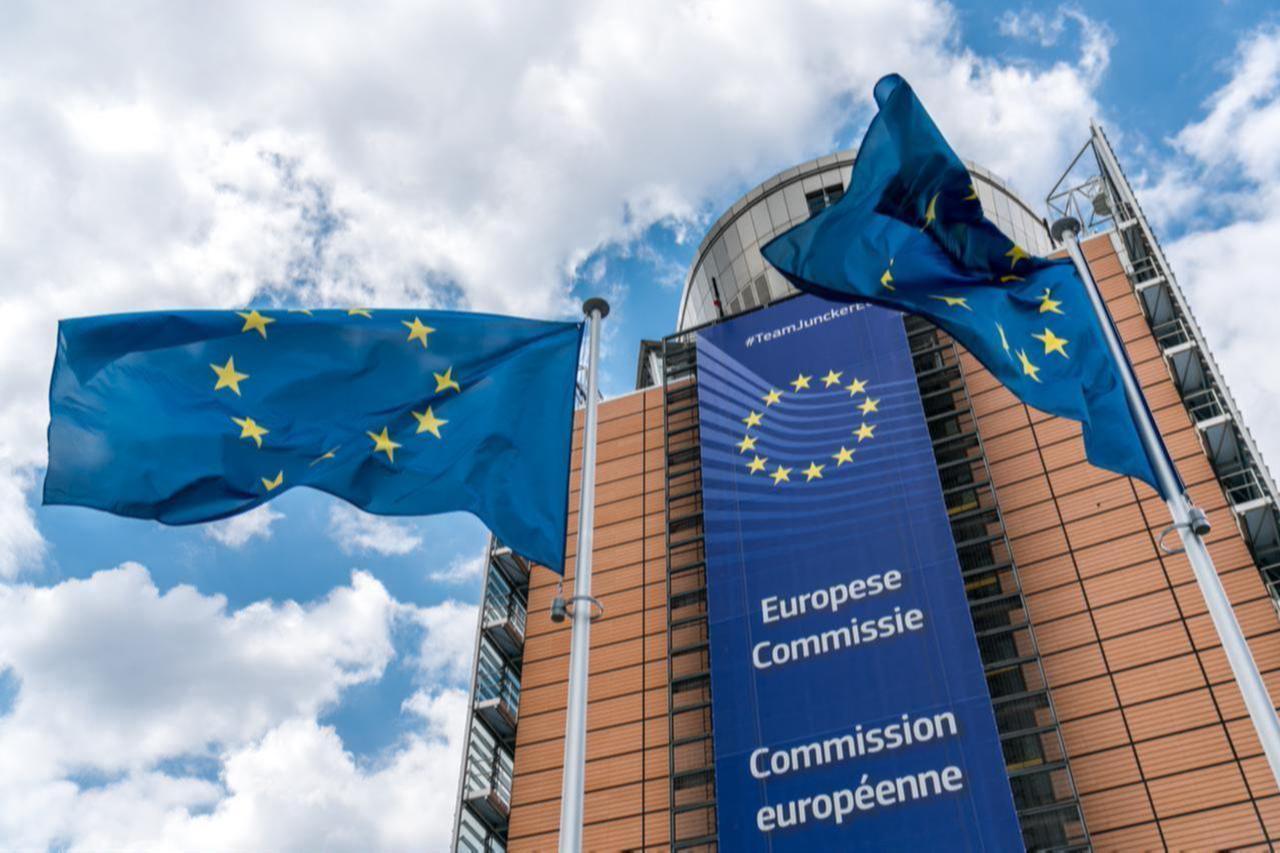 European Union flags wave in front of the Berlaymont building, headquarters of the European Commission, in Brussels, Belgium, July 1, 2019. (Adobe Stock Photo)