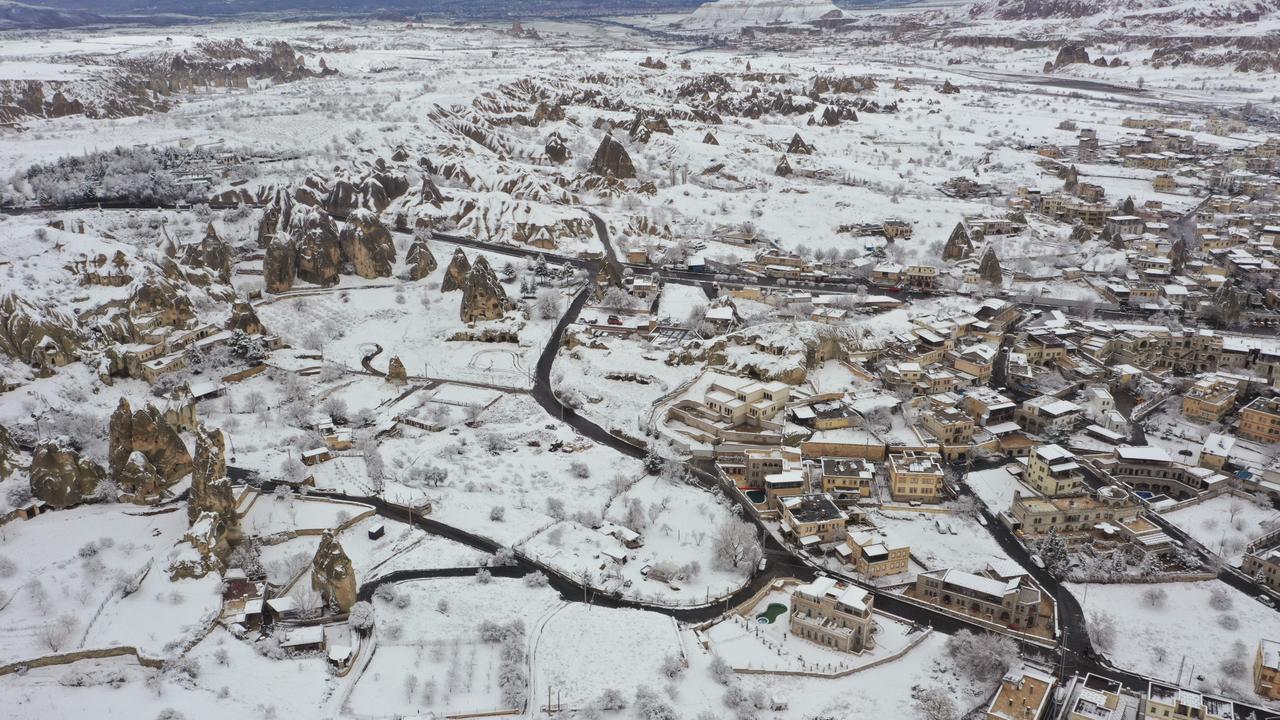 Winter snowfall transforms Cappadocia’s iconic fairy chimneys
