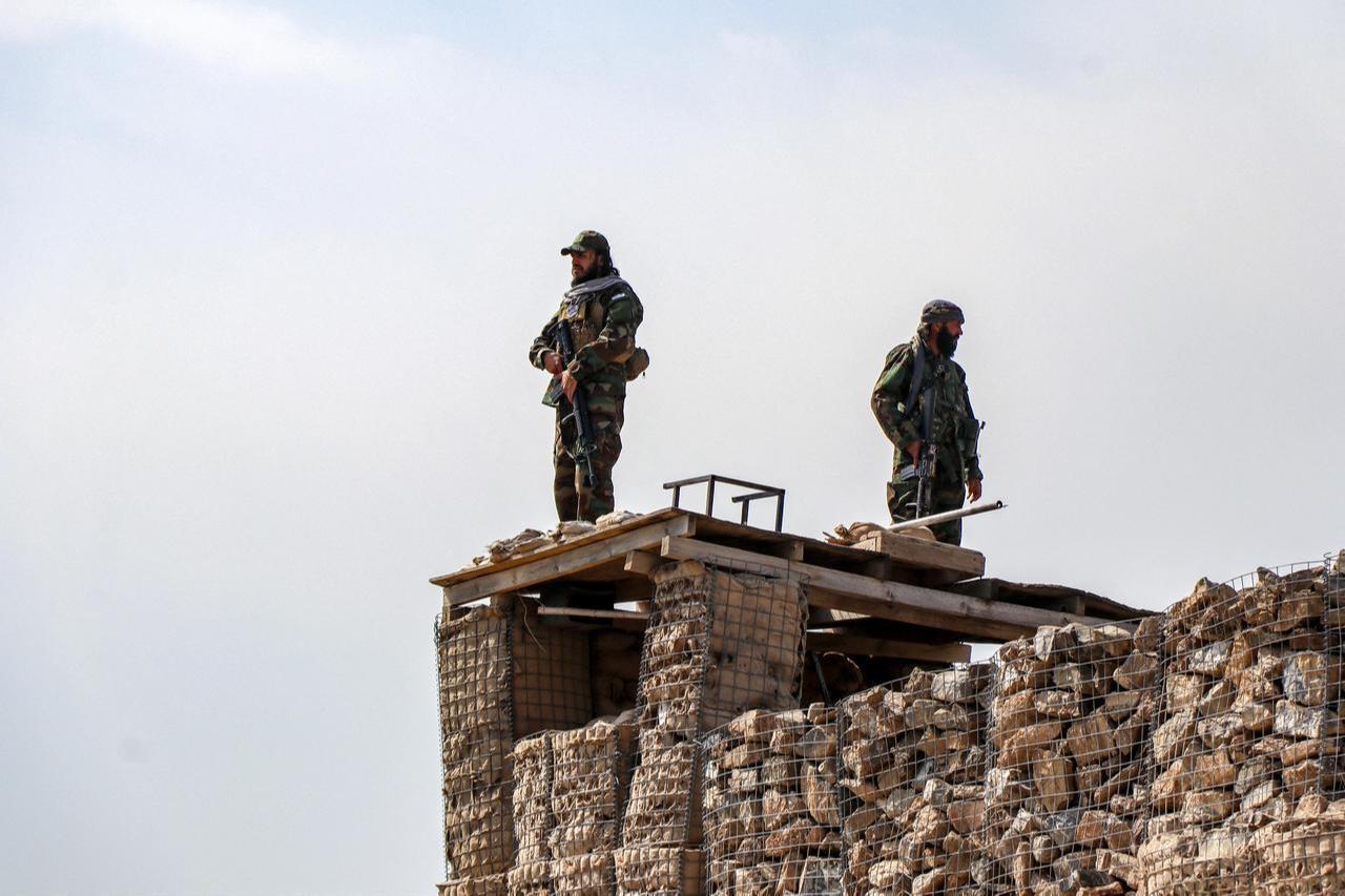 Taliban security personnel keep watch near the Durand Line in Gurbuz district of Khost province on February 27, 2026, following overnight cross-border fighting. (AFP Photo)