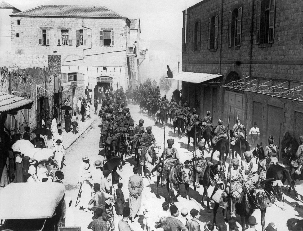 Indian cavalry passing through Haifa following the city's capture, 1918. (Photo via Imperial War Museum Photographic Archive)