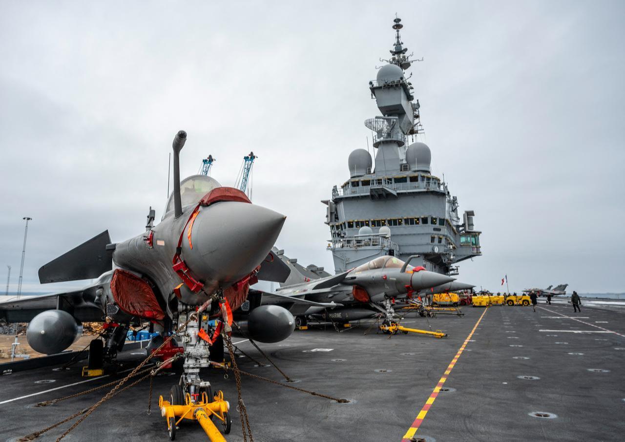 A picture taken Feb. 25, 2026, shows Rafale M (Marine) fighter jets parked on the flight deck of French aircraft carrier Charles De Gaulle in Malmo, Sweden. (AFP Photo)