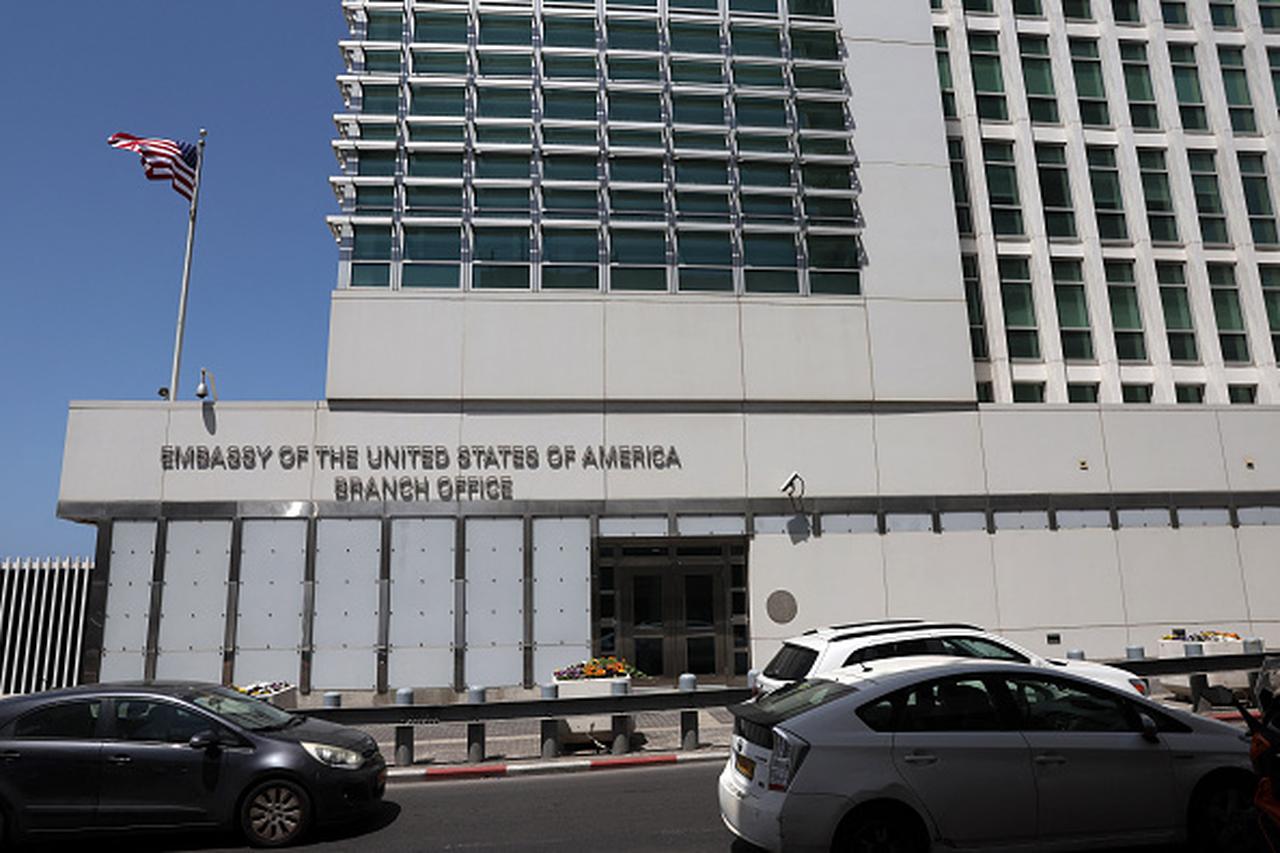 Cars drive in front of the US Embassy branch office in Tel Aviv on April 19, 2024. (AFP Photo)