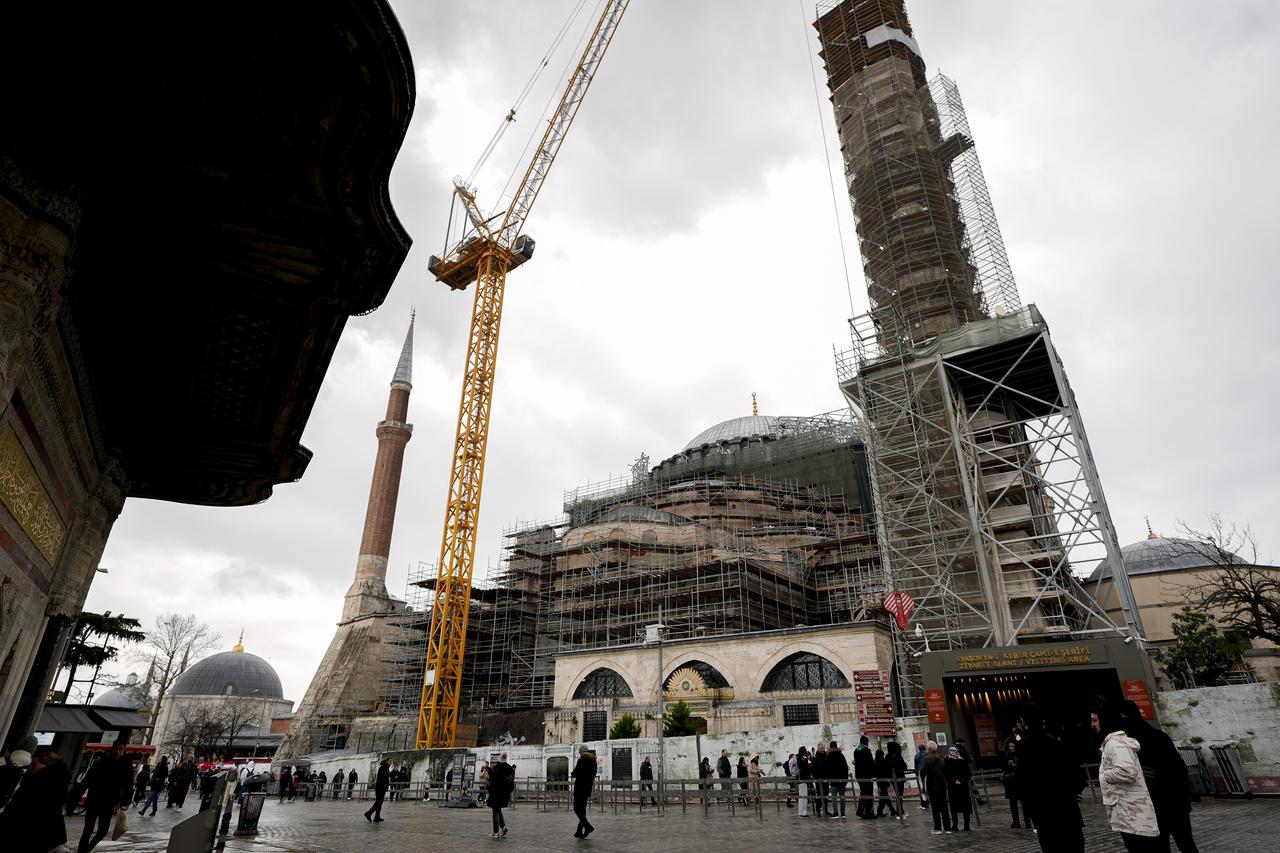 Exterior view of Hagia Sophia surrounded by scaffolding during restoration works overseen by Türkiye’s Culture and Tourism Ministry in Istanbul, Türkiye, Feb. 27, 2026. (AA Photo)
