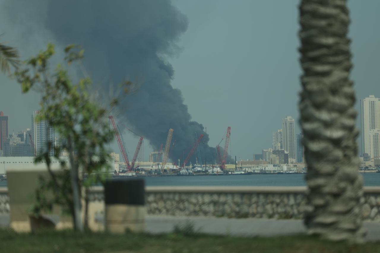 Scenes after a missile attack on the US Navy's 5th Fleet headquarters in Manama, Bahrain, with smoke was seen rising from the area. (AA Photo)