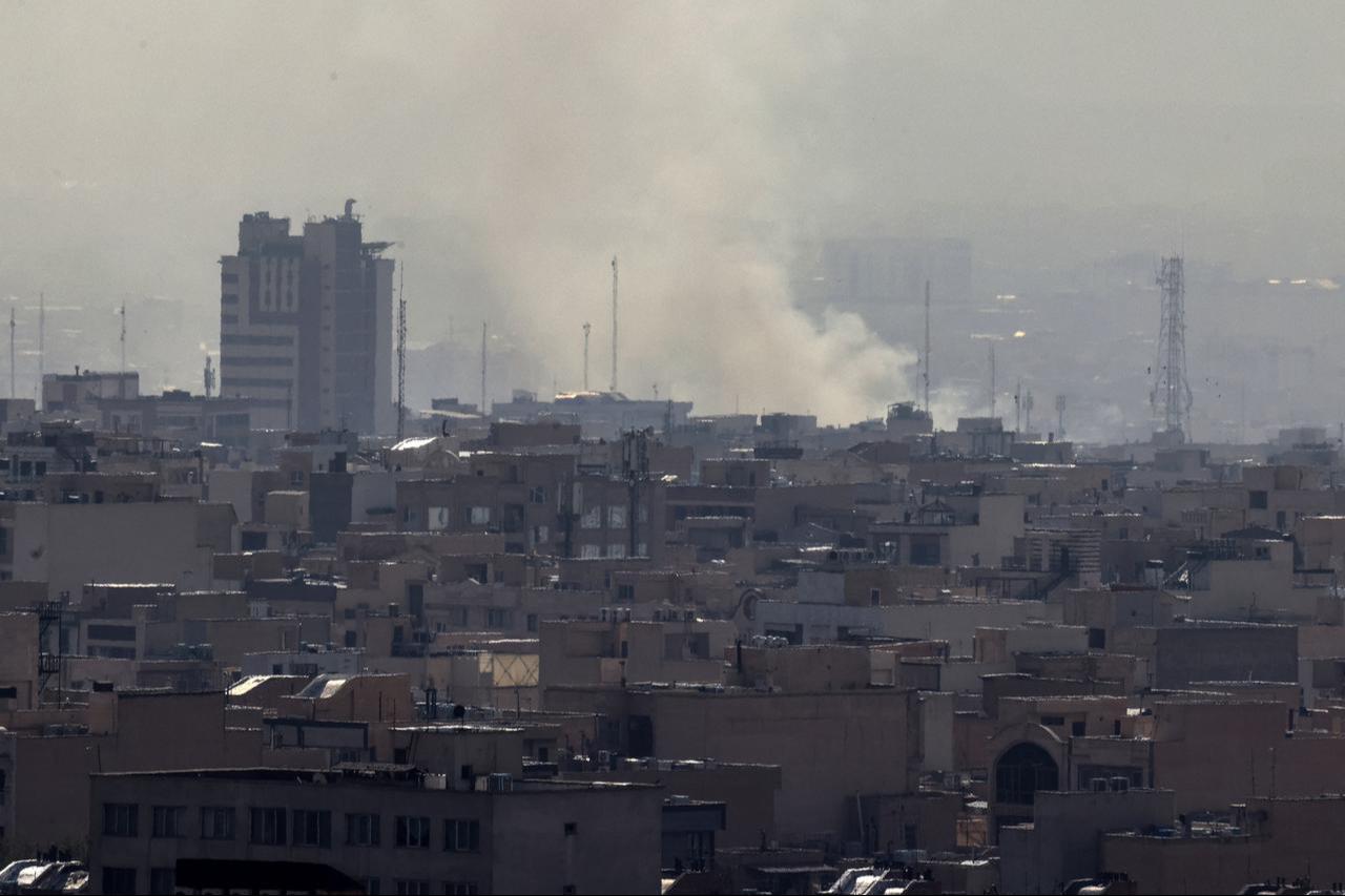 A plume of smoke rises following a reported explosion in Tehran on February 28, 2026. (AFP Photo)