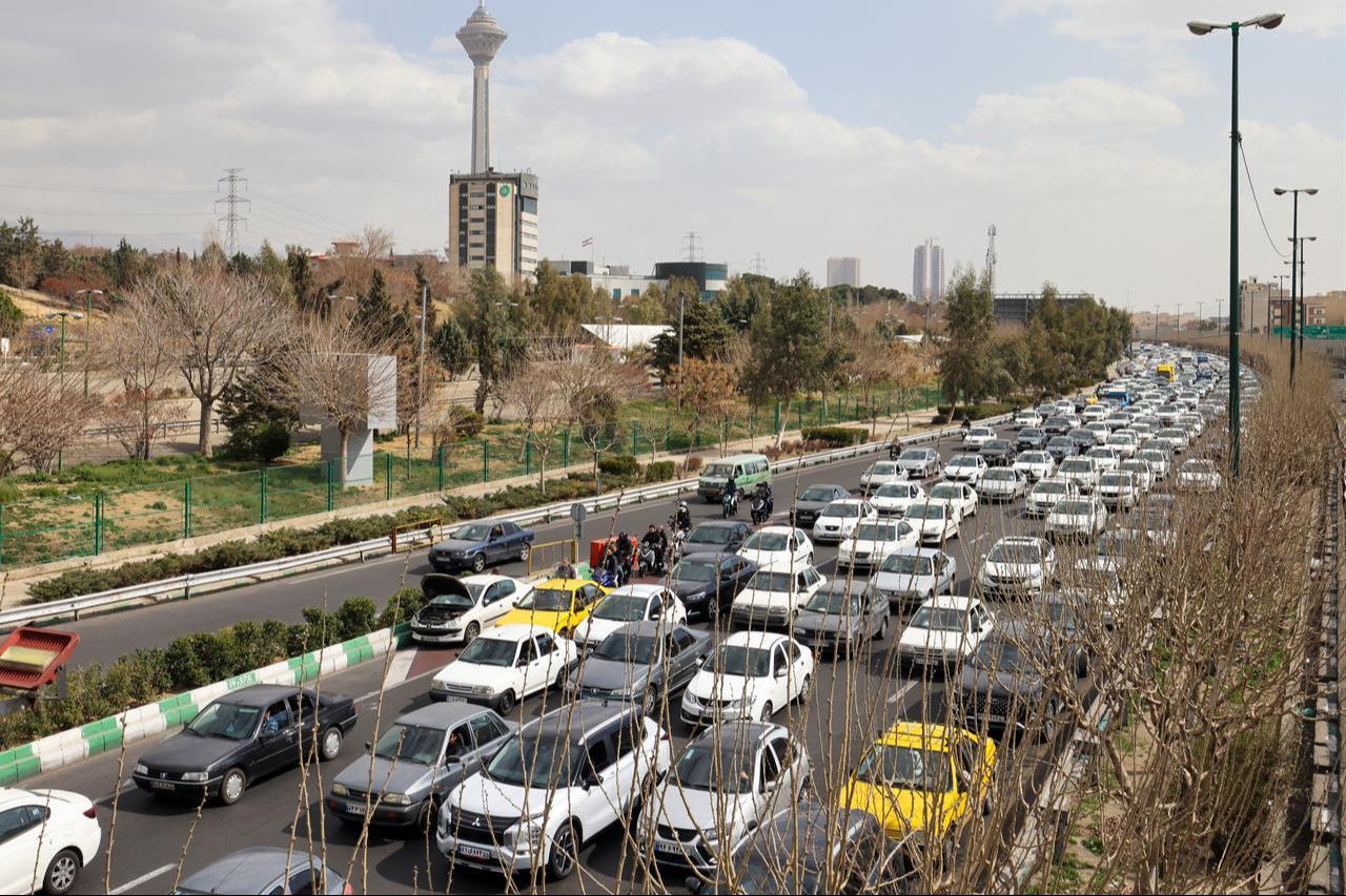 Motorists make their way along a street in Tehran on February 28, 2026. (AFP Photo)