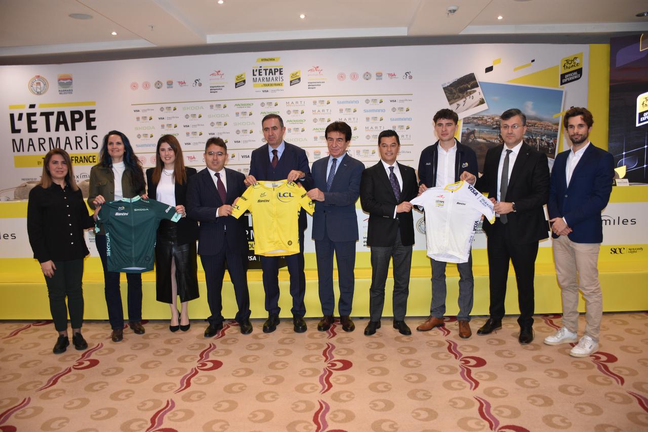 Officials, organizers, and sponsors pose with the iconic Tour de France jerseys during the press launch of L’Etape Marmaris by Tour de France, ahead of the race scheduled for June 7, 2026, in Marmaris, Türkiye. (Photo via L’Etape Marmaris)