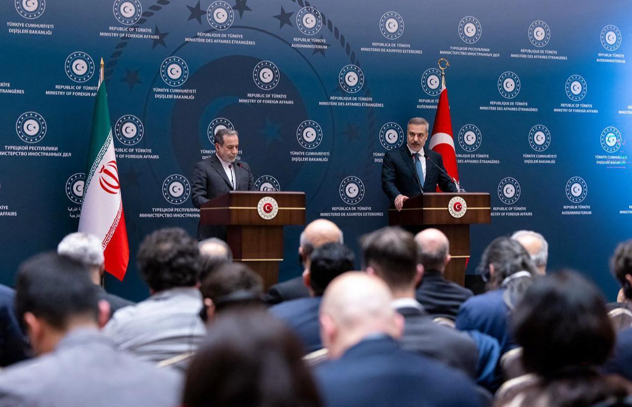 Turkish Foreign Minister Hakan Fidan (R) and Iran's Foreign Minister Abbas Araqchi (L) hold a joint press conference, Jan. 30, 2026. (Photo via Handout/Turkish Foreign Ministry Press Service/AFP)