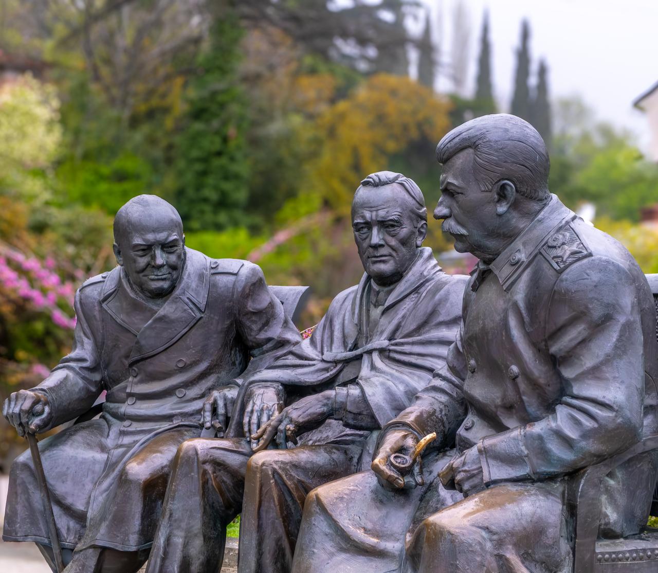 Statue of Franklin D. Roosevelt, Winston Churchill, and Joseph Stalin, Livadia Palace, Crimea. (Adobe Stock photo)