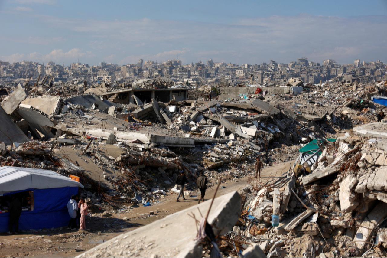 Displaced Palestinians live amongst the rubble and debris of homes and businesses destroyed by the Israeli military in military strikes in Jabalia refugee camp, in northern Gaza Strip on Jan. 17, 2026. (AFP Photo)