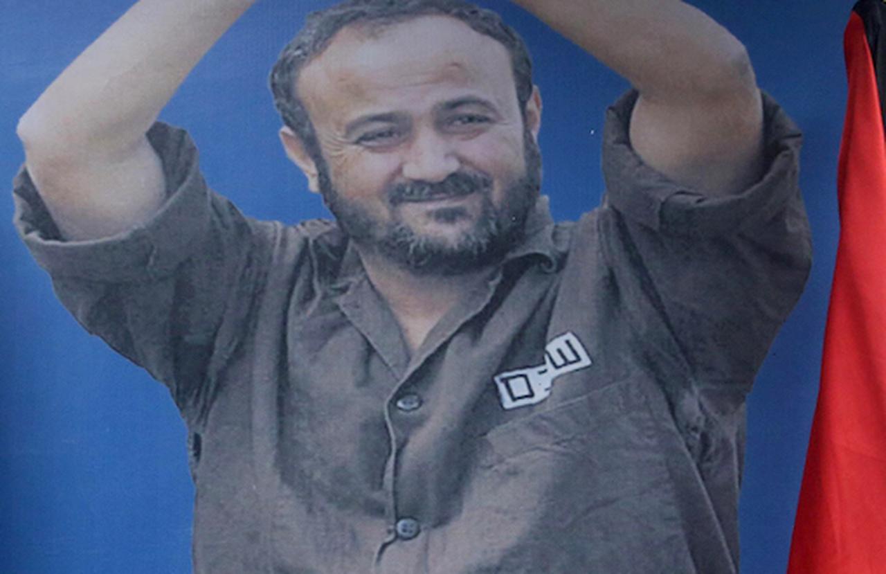 Marwan Barghouti's photo during a press conference in Ramallah, West Bank on May 7, 2017. ( AA Photo )