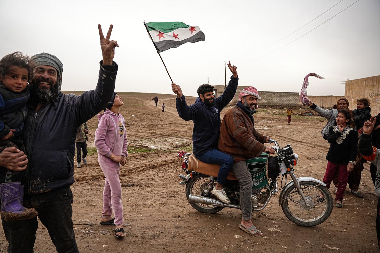 A convoy, belonging to the Syrian Ministry of Interior, consists of eight armored personnel carriers, numerous four-wheel-drive pickup trucks, ambulances and a mobile base station vehicle, and is moving along the eastern route in Al-Hasakah, Syria on February 2, 2026. (AA Photo)