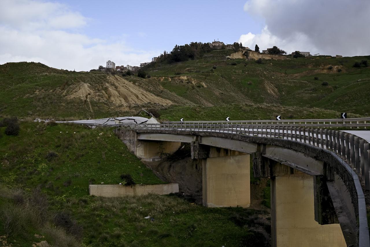 A view of the broken bridge on a provincial street after a massive landslide prompted local authorities to declare a red zone in Niscemi, Sicily, Italy, Feb. 2, 2026. (AA Photo)