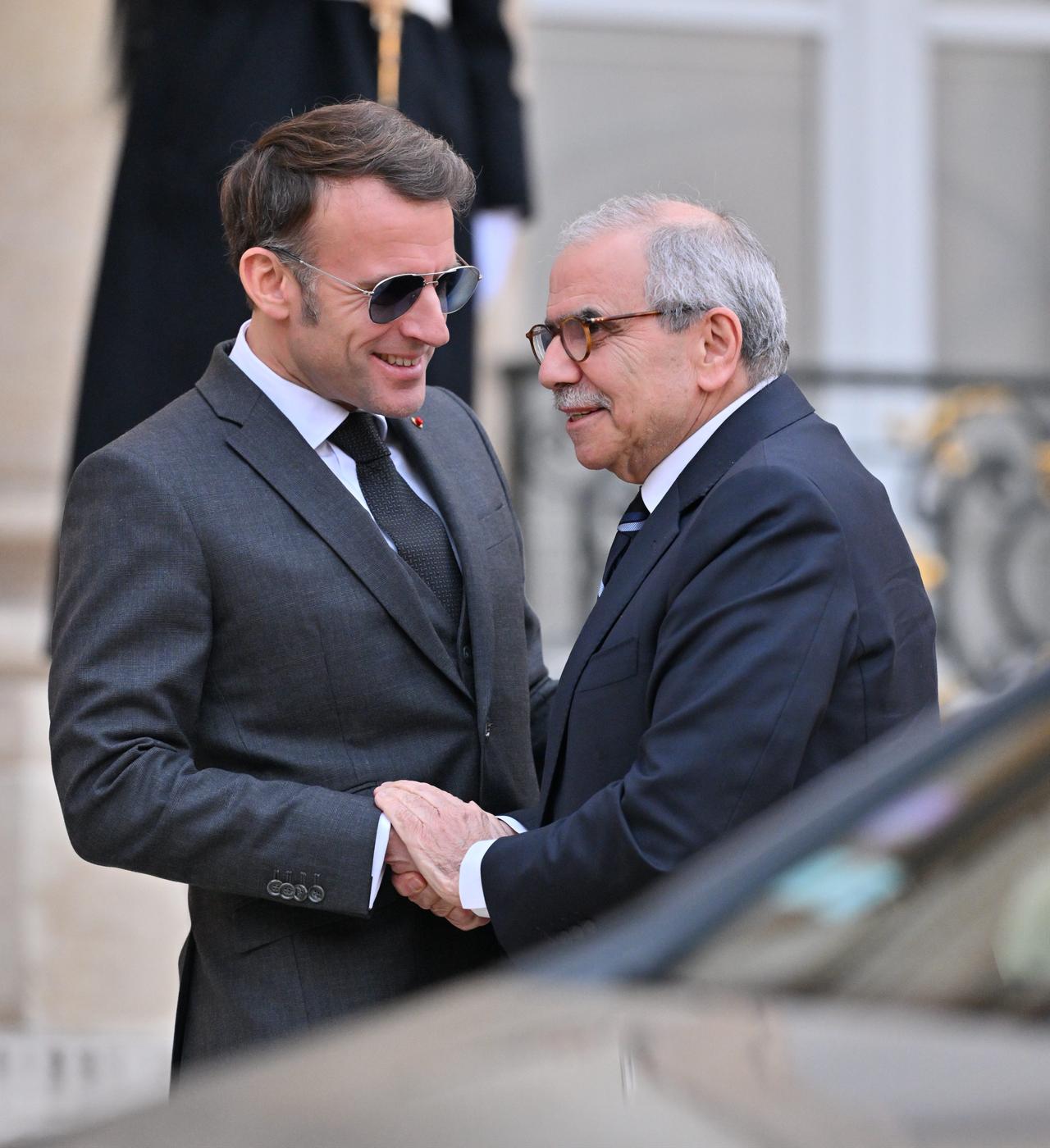 French President Emmanuel Macron (L) welcomes Prime Minister of Lebanon Nawaf Salam (R) at the Elysee Presidential Palace in Paris, Jan. 23, 2026. (AA Photo)