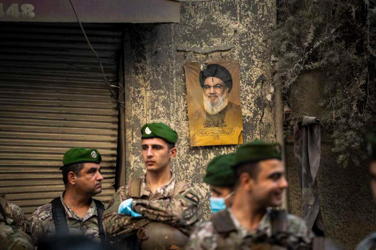 A portrait of Hezbollah's ex-leader Hassan Nassrallah on the wall at the site of the israeli strike in Basta, Central Beirut, November 23, 2024. (AFP Photo)