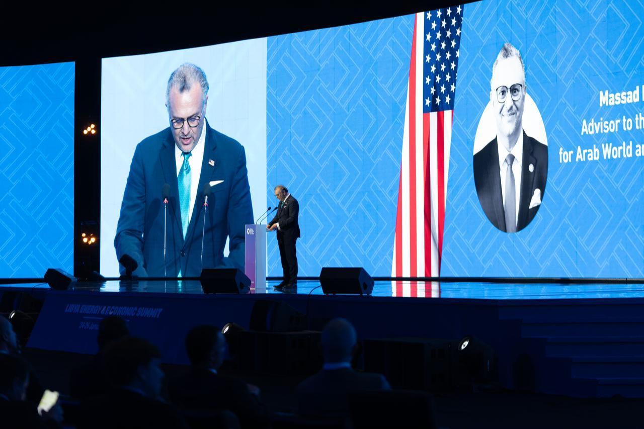 The image captures Massad Boulos, the U.S. Senior Advisor for Africa at the U.S. Department of State, speaking during the Libya Energy & Economic Summit (LEES) in Tripoli, which took place from January 24–26, 2026. (Photo via X/ @USEmbassyLibya)