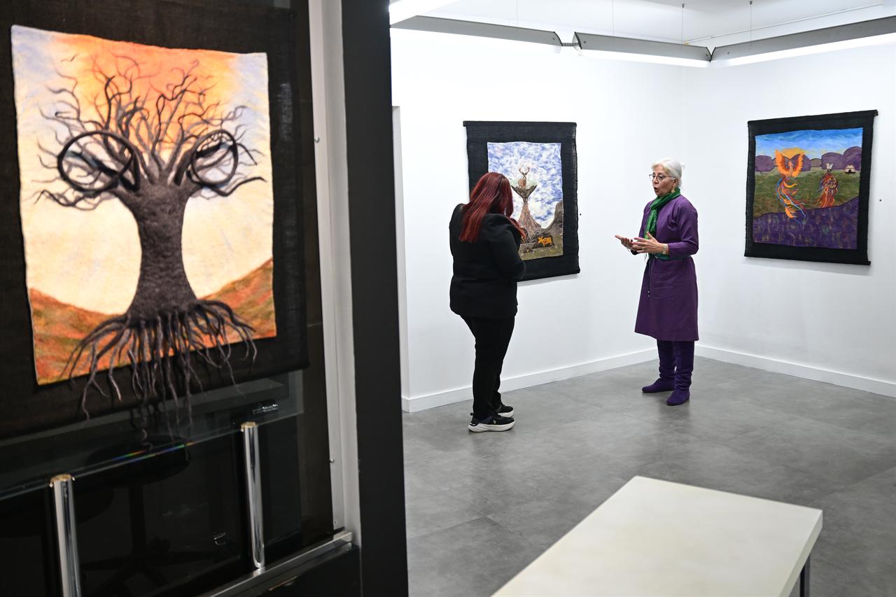 Felt artworks draw on petroglyph motifs found across Central Asia, translating rock carvings into textile-based forms. (AA Photo)