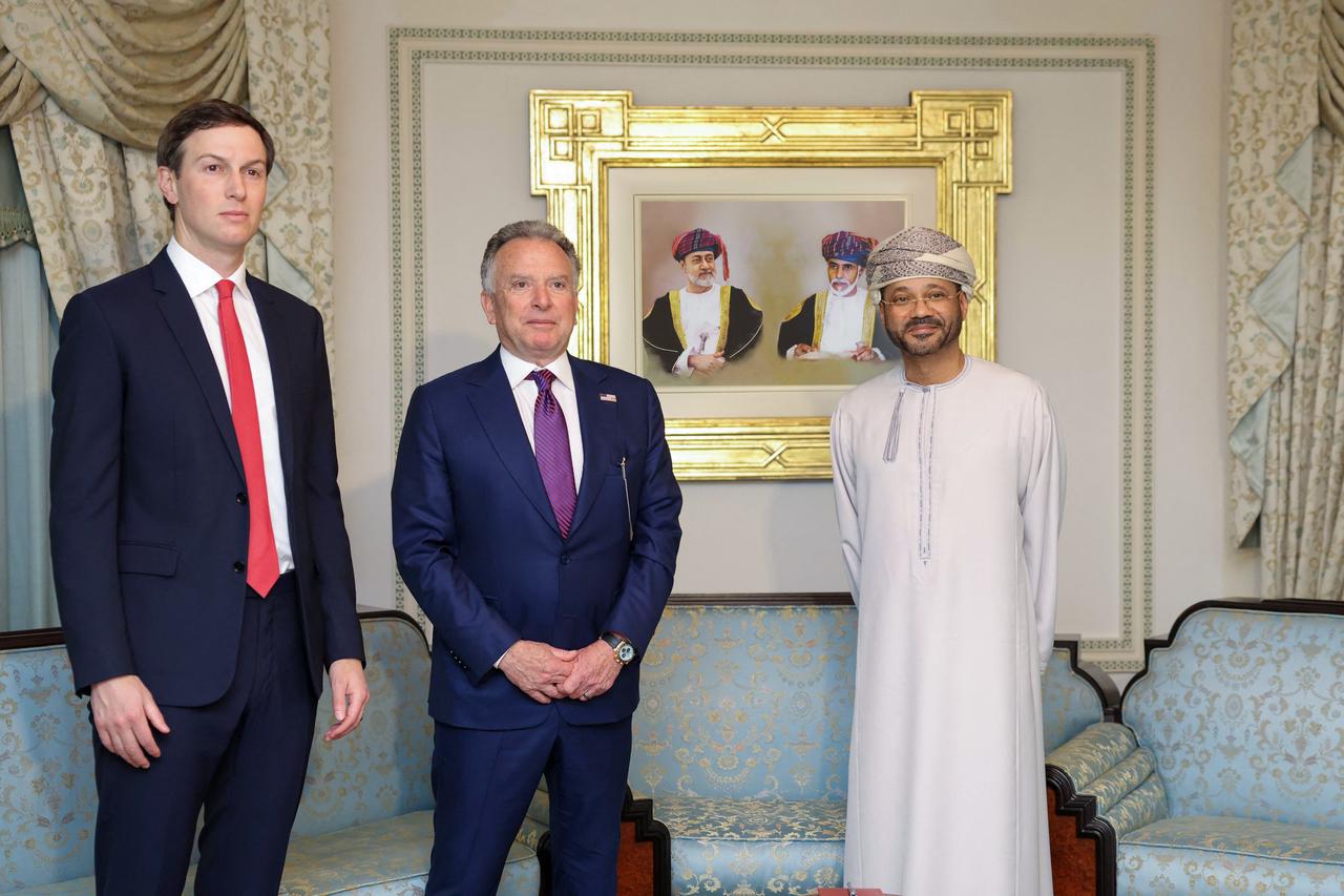 US special envoy Steve Witkoff (C), Jared Kushner and Oman’s Foreign Minister Badr bin Hamad al-Busaidi pose for a photo during a meeting in Muscat, Oman on Feb. 6, 2026 (Photo by Handout / Omani Foreign Ministry / AFP)