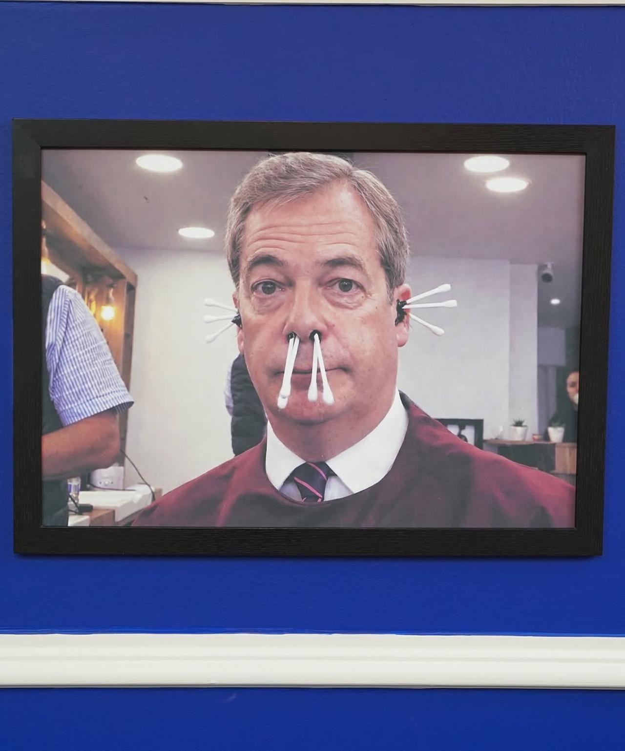Nigel Farage has been pictured with waxed cotton buds inserted in his nose and his ears being torched in a Turkish barber shop in Glasgow's West End. (Photo via Instagram/the.rebel.bear)