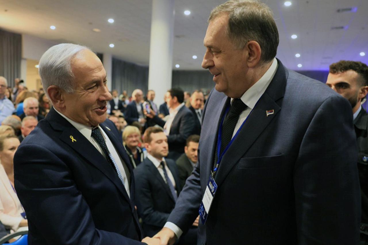 This photo shows Israeli PM Benjamin Netanyahu (L) shaking hands with then- Republika Srpska President Milorad Dodik (R) during an event in Tel Aviv, Israel, on March 27, 2025. (Photo via srna.rs)