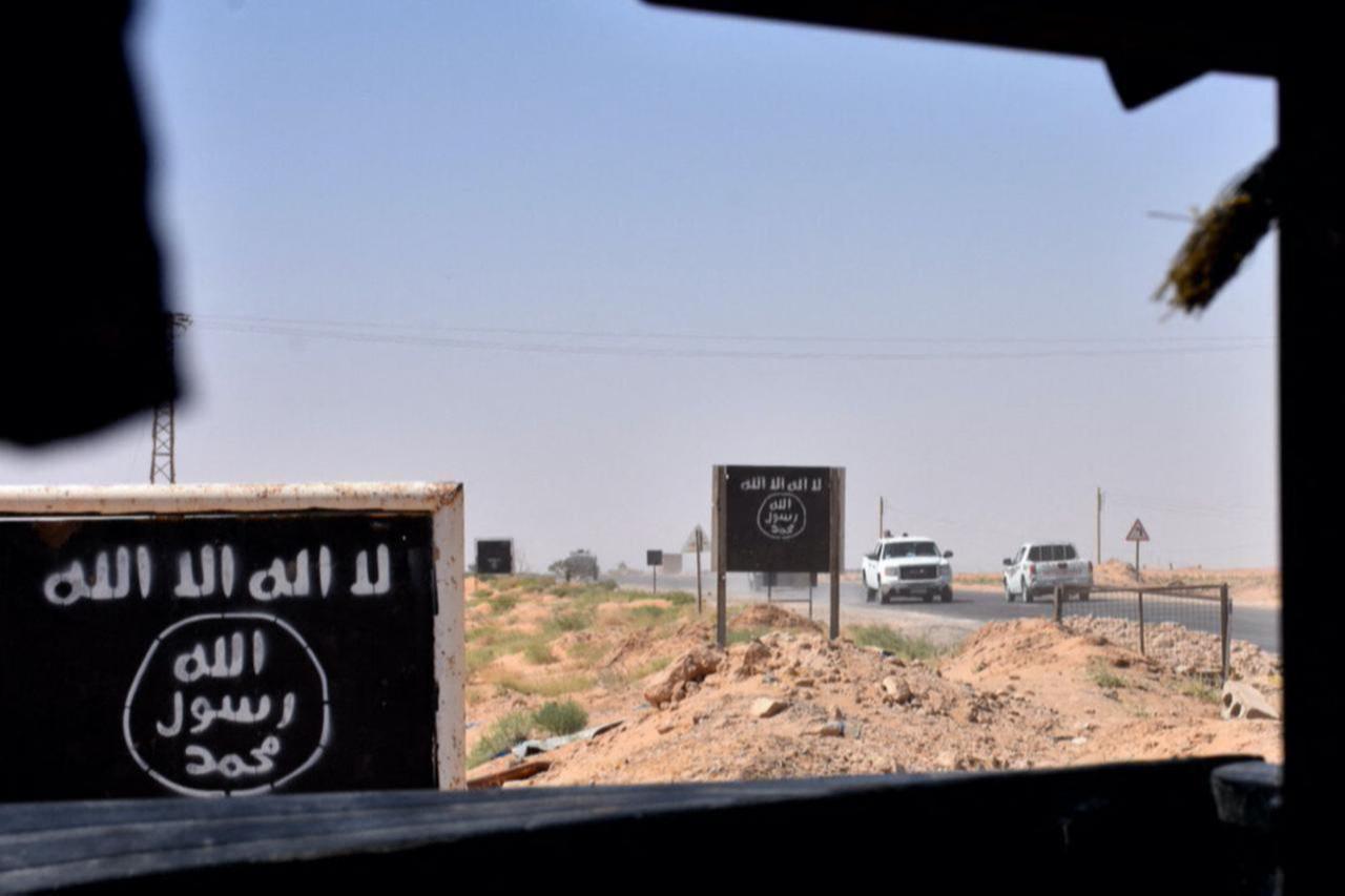 Billboards show the logo of Daesh group near the village of al-Maleha, in the northern countryside of Deir Ezzor, Syria on Sept. 9, 2017. (AFP Photo)