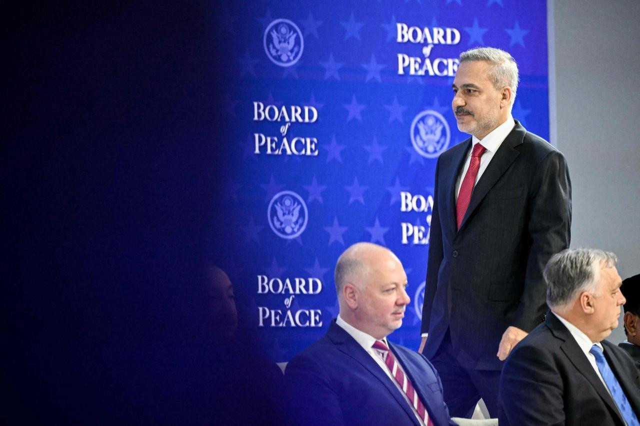 Foreign Minister Hakan Fidan arrives at the "Board of Peace" meeting during the World Economic Forum (WEF), Davos, Switzerland, Jan. 22, 2026. (AFP Photo)