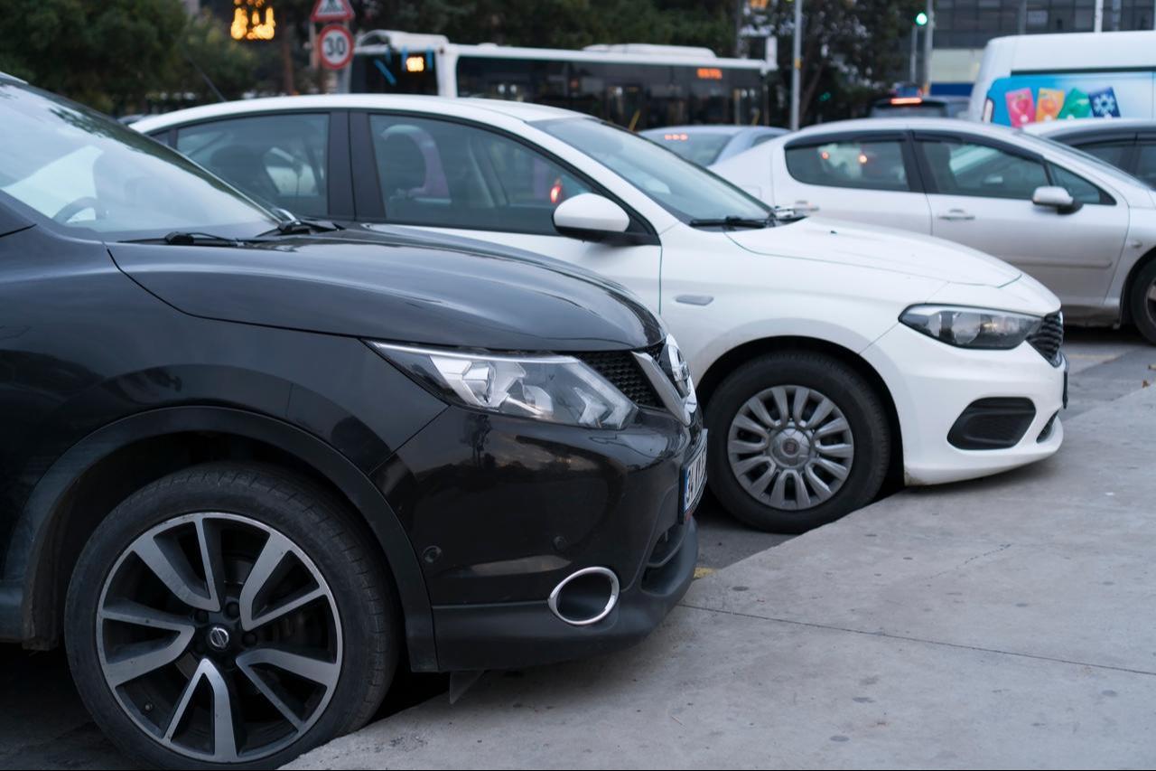 Cars parked side by side in an outdoor parking lot in Istanbul, Türkiye, Dec. 12, 2019.
