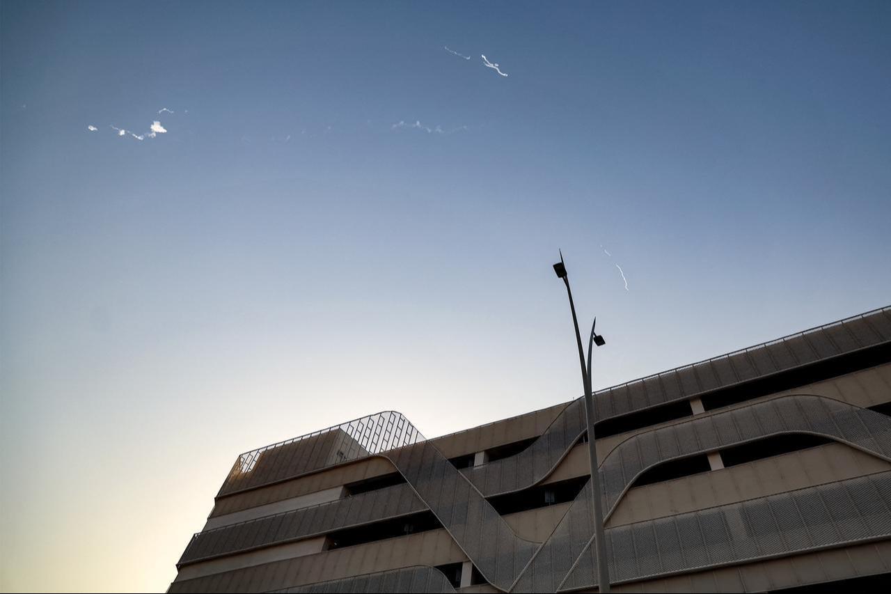 Smoke from a reported rocket interception is seen over a parking garage in Abu Dhabi on February 28, 2026. (AFP Photo)