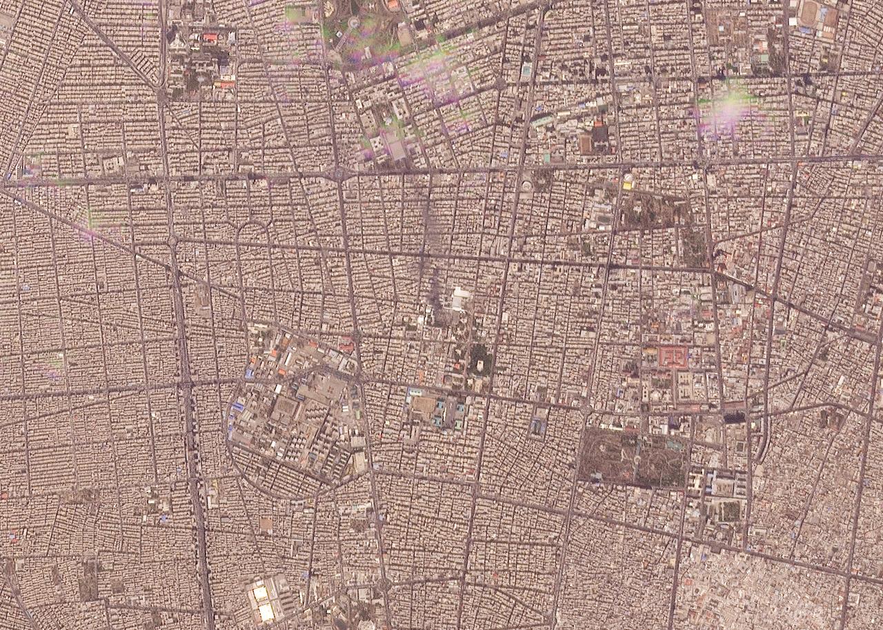 This handout satellite image, taken by Planet Labs PBC on February 28, 2026, shows a view of the Iranian capital, Tehran, following a strike. (Photo by 2026 Planet Labs PBC/AFP)