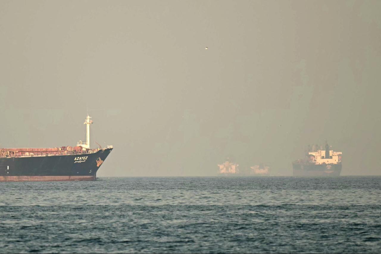 Cargo ships and tankers are seen off coast city of Fujairah, in the Strait of Hormuz in the northern Emirate on February 25, 2026. (AFP Photo)