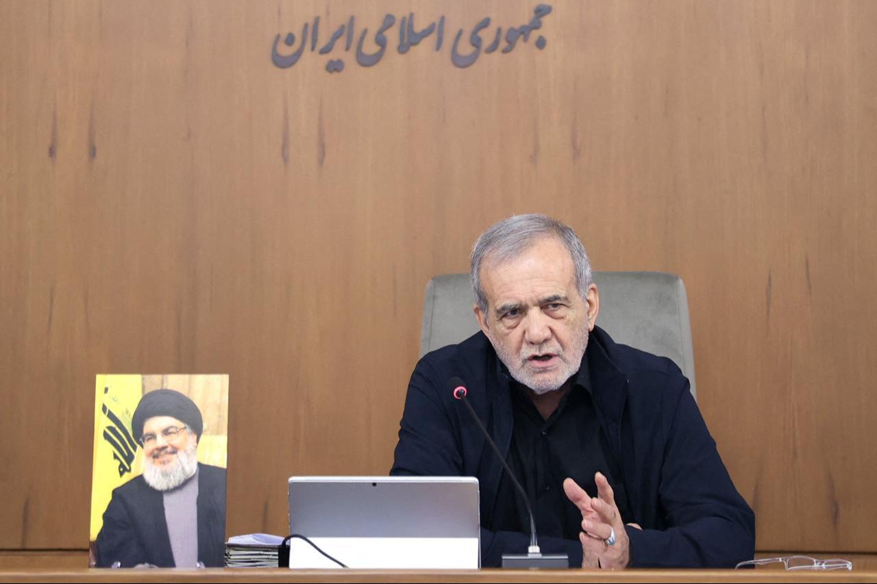 A handout picture provided by the Iranian presidency shows President Masoud Pezeshkian chairing a cabinet meeting in Tehran on October 2, 2024. (AFP Photo)