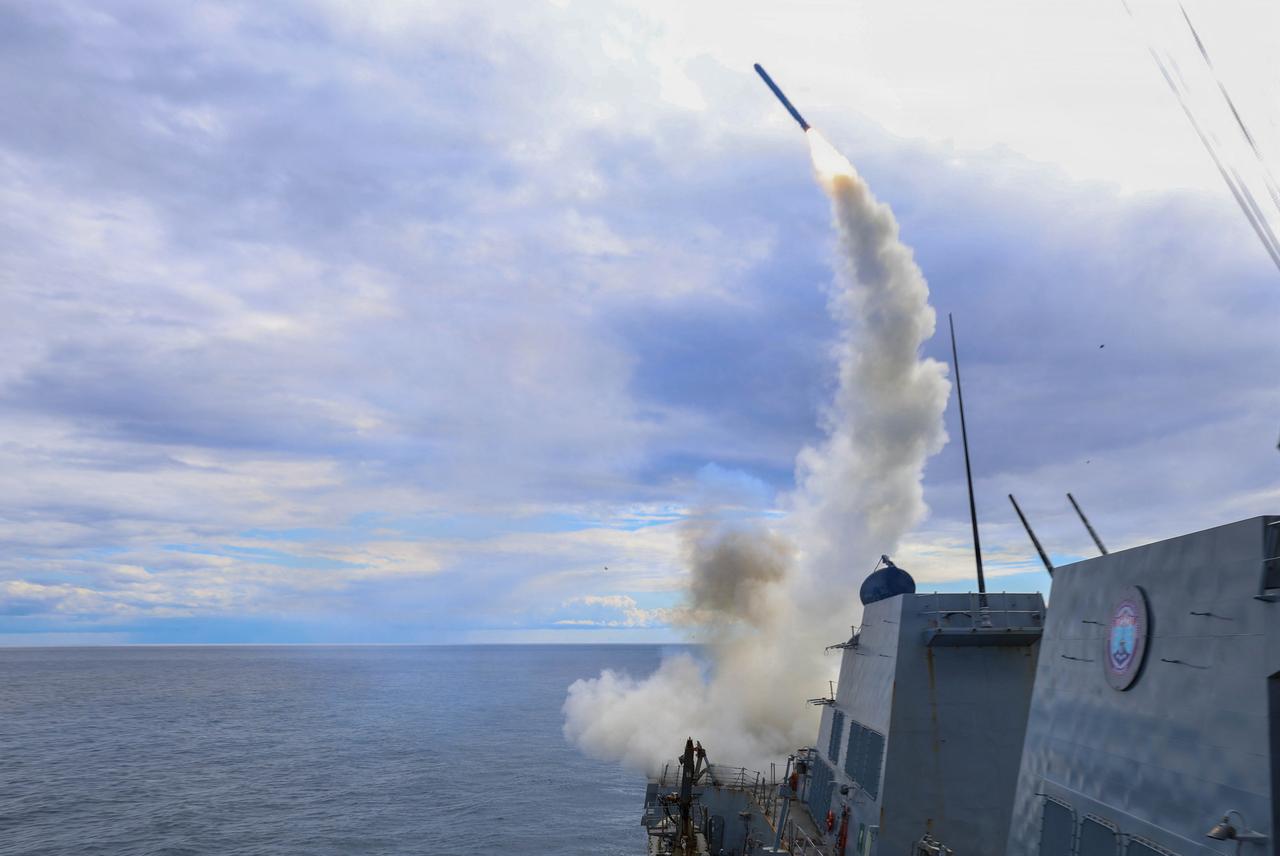 This US Navy photo released by US Central Command public affairs shows Arleigh Burke-class guided-missile destroyer USS Thomas Hudner (DDG 116) firing a Tomahawk land attack missile in support of Operation Epic Fury, from an undisclosed location on March 1, 2026. (AFP Photo)