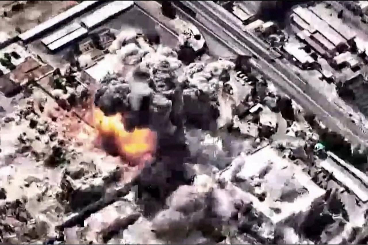 A video grab image taken from footage released by the Israeli military on March 1, 2026, shows a  large-scale Israeli strike in Tehran (Photo by Handout/Israeli Army/AFP)