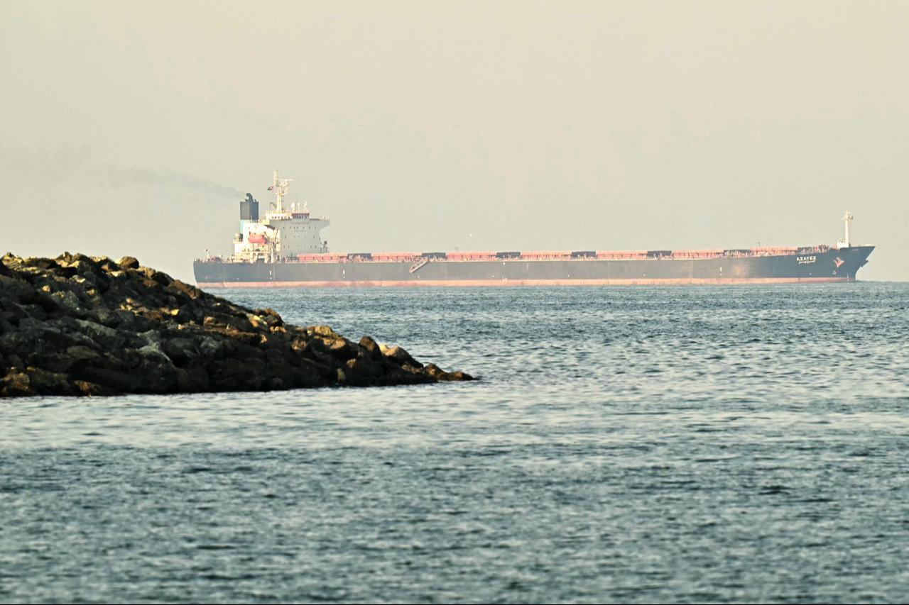 A cargo ship is pictured off the coast of the city of Fujairah, in the Strait of Hormuz, in the northern Emirate, February 25, 2026. (AFP Photo)