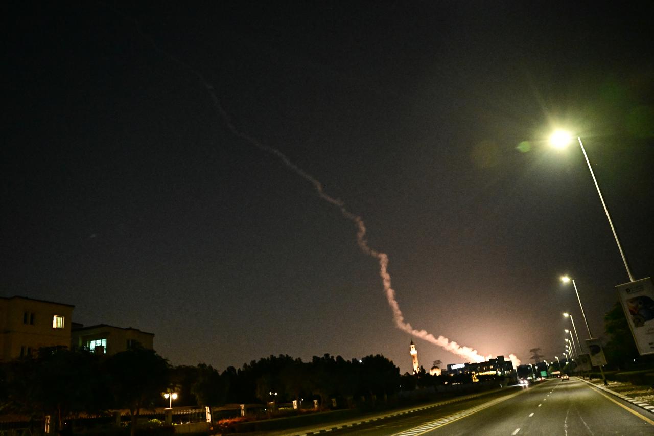 Smoke from a reported rocket interception is seen in the sky over in Dubai, February 28, 2026. (AFP Photo)