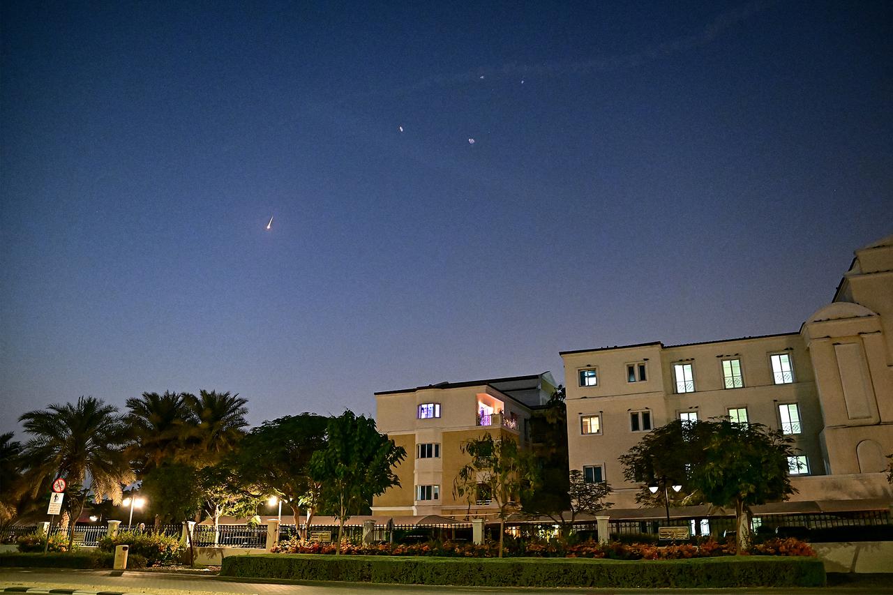 Smoke from a reported rocket interception is seen in the sky over in Dubai, February 28, 2026. (AFP Photo)